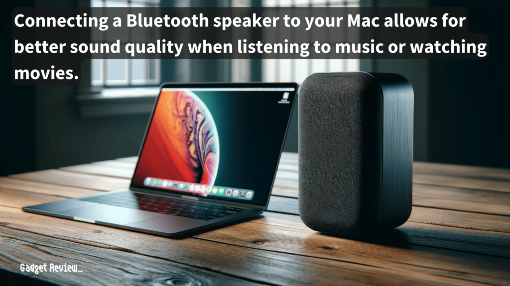 speaker next to a laptop