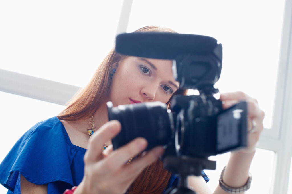 woman recording vlog video blog using dslr camera 2021 08 26 15 46 04 utc